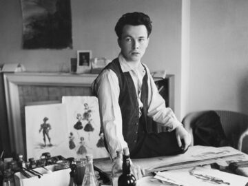 Male Illustrator Sitting at Work Table